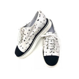 Chanel Women's Black and White Monogram Shoelace Sneakers – Loop Generation